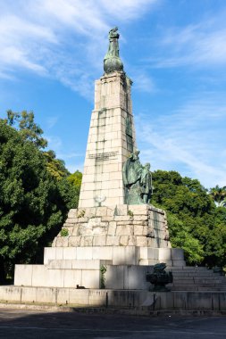 Beautiful view to central monument with statue on green public square, Rio de Janeiro, Brazil