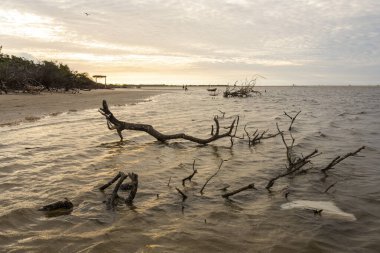 Beautiful view to sunset with clouds in Atins Beach, Lenis Maranhenses, Maranho State, Brazil.