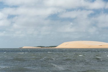 Beautiful view to sand dunes by the river in Maranho State, Brazil.