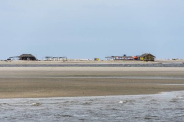 Beautiful view to fisherman hut by the river in Lenis Maranhenses, Maranho State, Brazil.