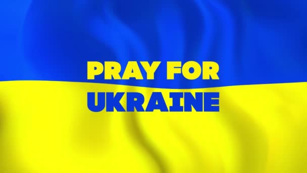Blauwe gele Oekraïense vlag met bidden voor ukraine belettering naadloze lus 4k. Stop de Russische agressie tegen Oekraïne. — Stockvideo