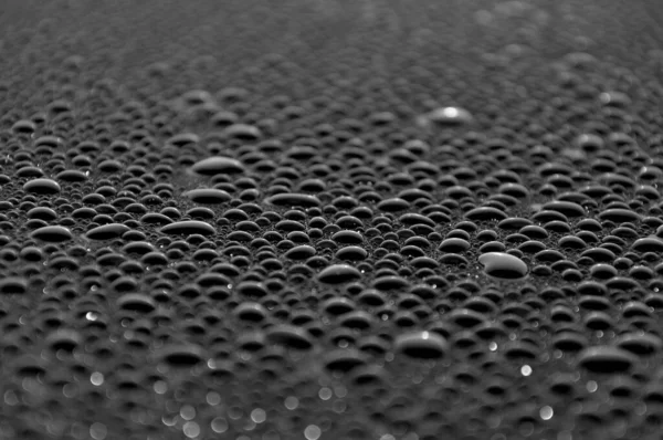 Raindrops Black Surface Black White Background — Stock Photo, Image