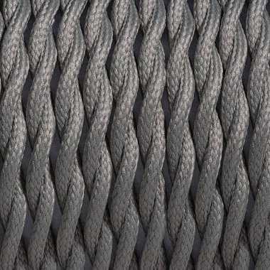 Renkli örülmüş ve kıyılmış kablo dokusu arka planı. Görünür dokuya yakın çekim