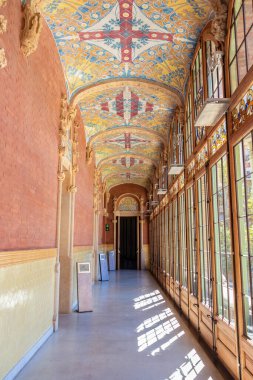 Barcelona, Spain - September 19, 2021: Corridor i nside of Hospital of the Holy Cross and Saint Paul (de la Santa Creu i Sant Pau) clipart