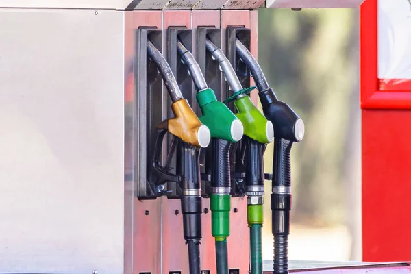 Pump nozzles of a petrol pump in service station