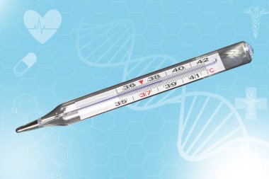 Analog clinical thermometer, mercury free, calibrated in degrees centigrade indicating a temperature of 38.5 degrees centigrade. Fever or illness concept clipart