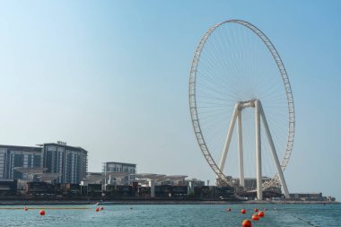 Dubai, BAE, 2 Ekim 2019 - Birleşik Arap Emirlikleri 'nde Ain Dubai' de büyük bir dönme dolap. Bluewater Adası 'nın Skyline hattı. Mimarlık ve cazibe