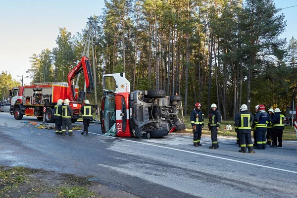 September 30, 2021,Upesciems Latvia: car accident on a road, fire truck after a collision with a car, transportation background