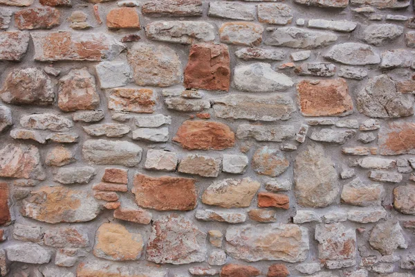 Antiguo Muro Construido Con Piedras Rojas Blancas Naranjas —  Fotos de Stock
