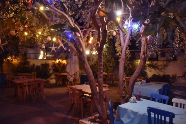 Aegean Mediterranean Restaurant Lovely Garden Cute Lamps Hanging Trees Tables — Stock Photo, Image