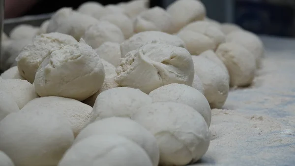 Prepared dough balls for restaurant baking. Pizza, pita, dough balls