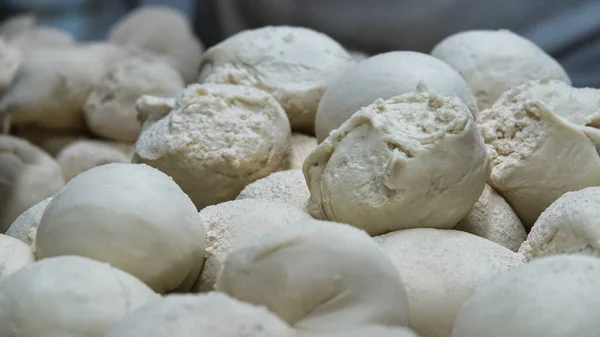 Prepared dough balls for restaurant baking. Pizza, pita, dough balls