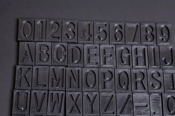 Letterpress Alphabet Numbers Black Background — Stock Photo, Image