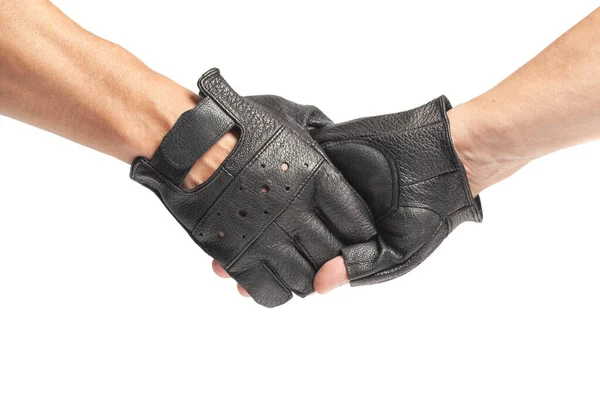 Handshake em motoristas luvas de couro masculino isolado em um branco — Fotografia de Stock