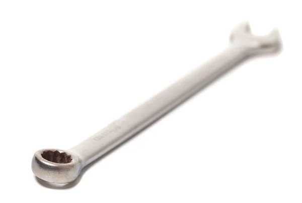 Гайковий металевий ключ ізольований на білому тлі — стокове фото