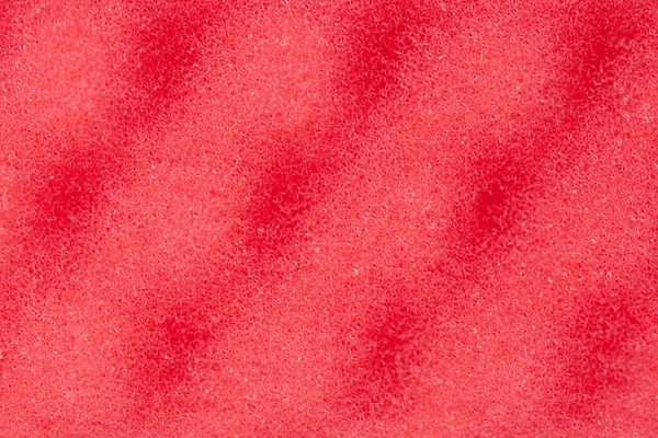 红色海绵纹理背景。泡沫橡胶衬底 — 图库照片