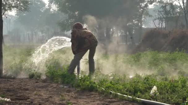 Clip Indian Farmer Changes Flow Water His Field Silhouette View — стоковое видео