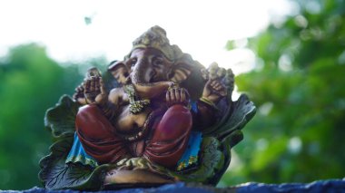 Eco friendly Ganesh or Ganpati idol or murti, home made. selective focus. Ganesha chaturthi festival 2022.