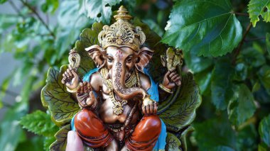 Close up of beautiful Ganesha idol. Ganesh Chaturthi is a Hindu festival celebrating the arrival of Ganesha to earth.