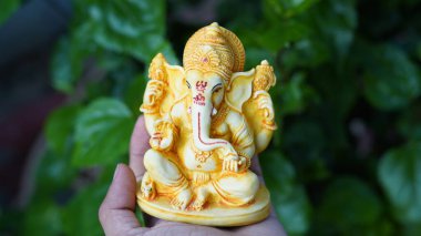 Close up of beautiful Ganesha idol. Ganesh Chaturthi is a Hindu festival celebrating the arrival of Ganesha to earth.