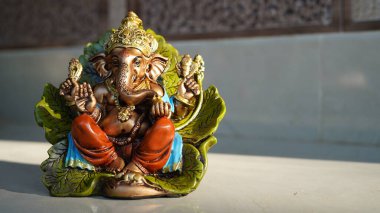 Eco friendly Ganesh or Ganpati idol or murti, home made. selective focus. Ganesha chaturthi festival 2022.