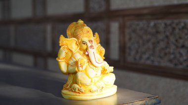 Happy Ganesh Chaturthi festival, Lord Ganesha statue with beautiful background, Ganesh is hindu god of Success.