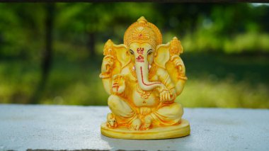 Close up of beautiful Ganesha idol. Ganesh Chaturthi is a Hindu festival celebrating the arrival of Ganesha to earth.