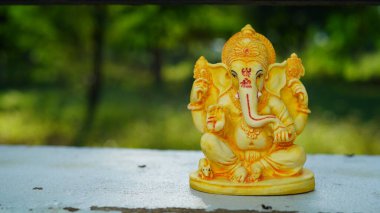 Close up of beautiful Ganesha idol. Ganesh Chaturthi is a Hindu festival celebrating the arrival of Ganesha to earth.