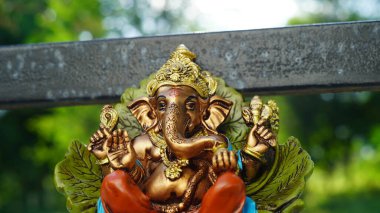 Close up of beautiful Ganesha idol. Ganesh Chaturthi is a Hindu festival celebrating the arrival of Ganesha to earth.