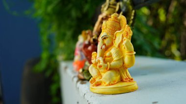 Eco friendly Ganesh or Ganpati idol or murti with nature background, home made. selective focus. Ganesha chaturthi festival 2022.