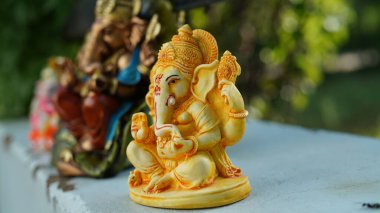 Close up of beautiful Ganesha idol. Ganesh Chaturthi is a Hindu festival celebrating the arrival of Ganesha to earth.