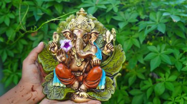 Close up of beautiful Ganesha idol. Ganesh Chaturthi is a Hindu festival celebrating the arrival of Ganesha to earth.
