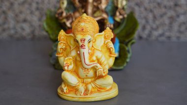 Close up of beautiful Ganesha idol. Ganesh Chaturthi is a Hindu festival celebrating the arrival of Ganesha to earth.