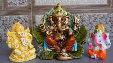 Ganesha Chaturthi Festival 2022, Lord Ganesha Statue. Three colorful ganesha Idol.