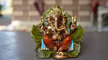 eco friendly Ganesh or Ganpati idol or murti, home made. selective focus
