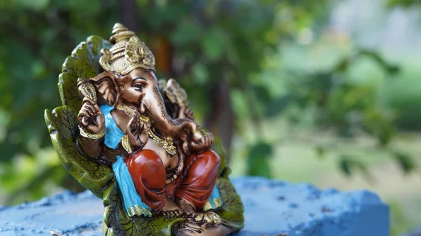 Close up of beautiful Ganesha idol. Ganesh Chaturthi is a Hindu festival celebrating the arrival of Ganesha to earth.