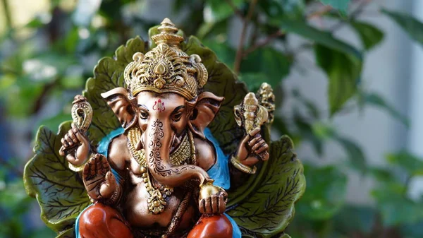 Eco friendly Ganesh or Ganpati idol or murti, home made. selective focus. Ganesha chaturthi festival 2022.