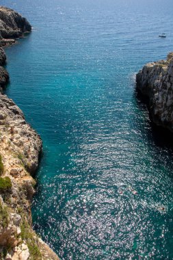 Landscape of Ponte Ciolo from its bridge,, a narrow coastal inlet  located in  Salento, Apulia, Italy
