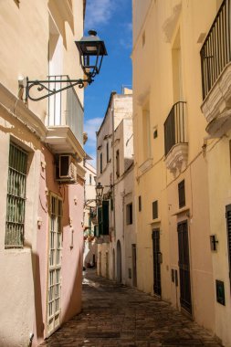 narrow streets of Gallipoli historical center, Apulia region, Italy