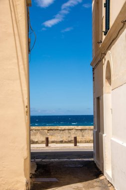 narrow streets of Gallipoli historical center, Apulia region, Italy
