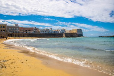 At Gallipoli, Italy, On 08/08/2022, the beach with the background of the city,