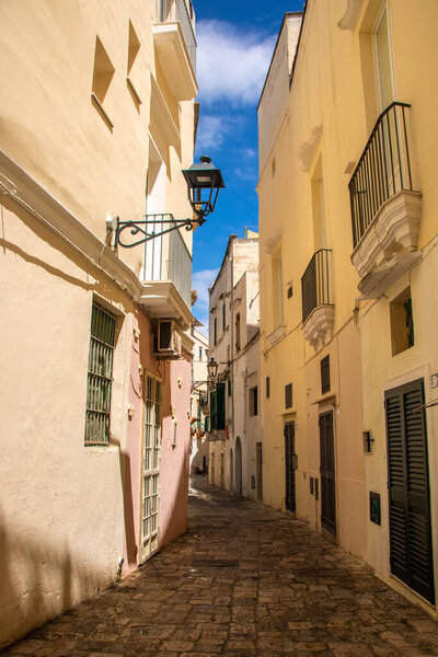 Narrow streets of Gallipoli historical center, Apulia region, Italy