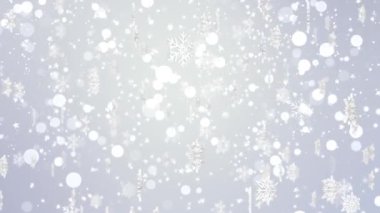 4K Kar, kışın Noel döngüsünde mavi parçacıklarla beyaz gökyüzüne düşüyor..