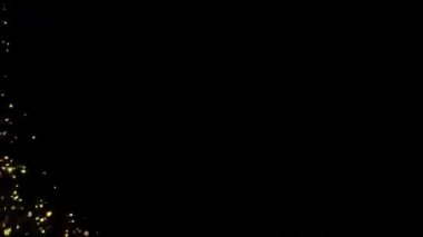 Altın Bokeh parçacıklarının uçuşu Döngü Animasyon Sihirli parıldayan Işık. Mutlu Noeller.