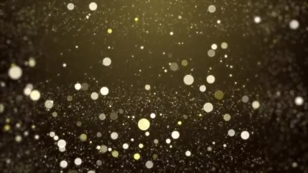 Золотые сверкающие частицы, падающие на задний план экрана. — стоковое видео