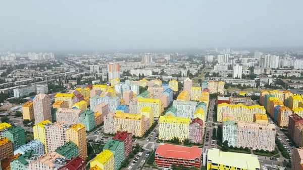 Aerial cityscape view of modern residential area with colour buildings — Stock Photo, Image