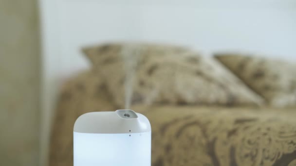 Male Hand Turns Modern Humidifier Aroma Oil Diffuser Bedroom — Stok Video