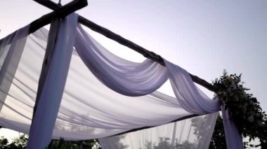 Bypass of the chuppah in the wedding hall. High quality FullHD footage