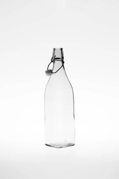 Monochromatic Image Retro Empty Square Glass Bottle Open Clip Top — Stock Photo, Image