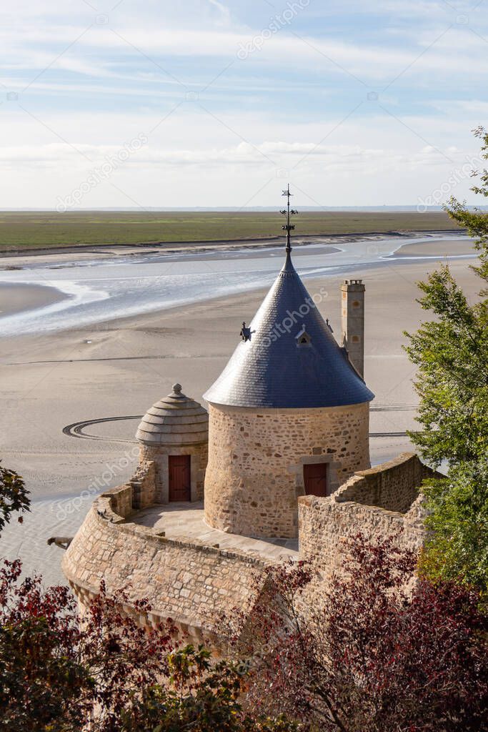 Tower in the ramparts of Mont Saint-Michel with view on the bay